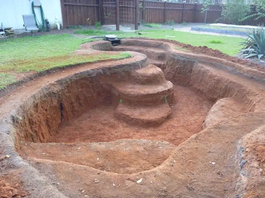 a pond project in progress. this multi layered pond has taken lots of planning.