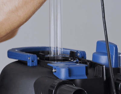 Lifting the UV bulb out of the filter unit